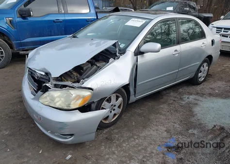 2005 Toyota Corolla Le z USA, uszkodzony, nr VIN 2T1BR32E15C409033